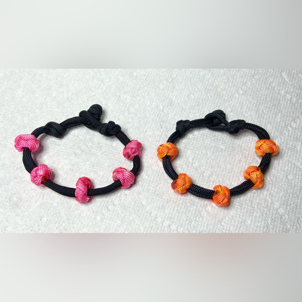 Set Of 2 Black Parachute Cord Bracelets Adjustable Braided Bead Pink And Orange